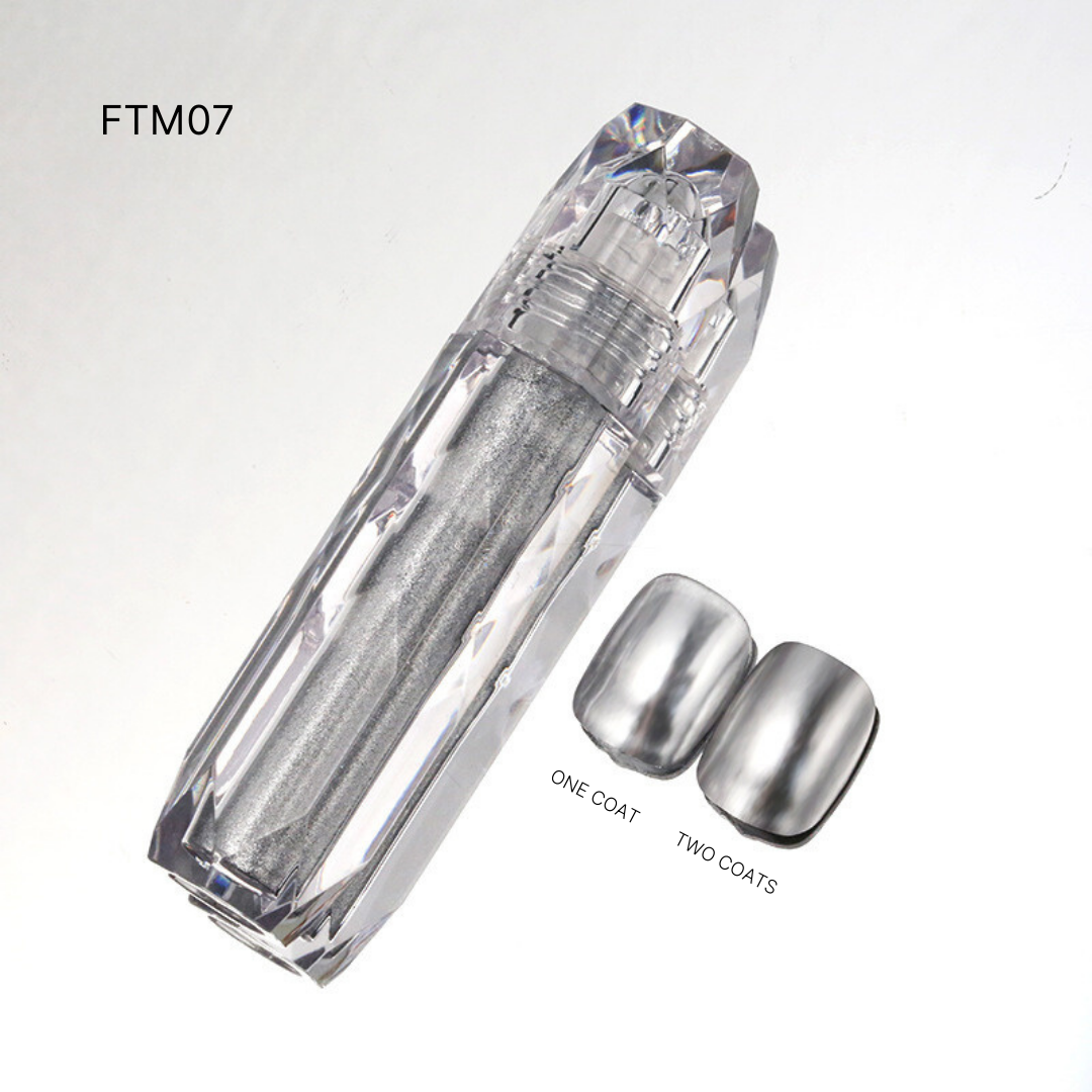 FTM07 displays silver Liquid Chrome nail polishes, providing a sleek, futuristic look with a mirror-like finish.