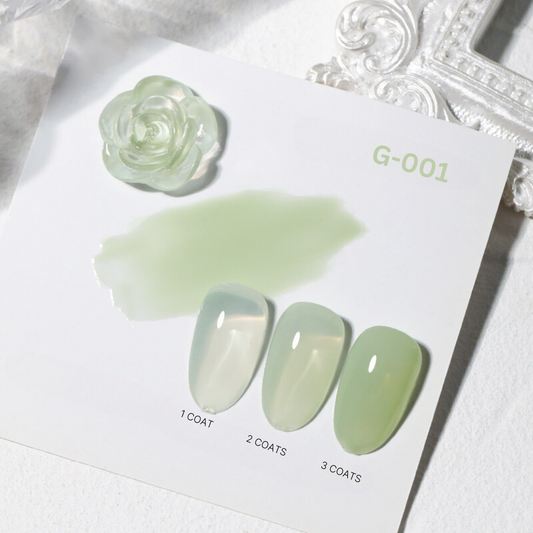 Icy Sheer Green Jelly Gel Polish #G-001: Light pastel green with a sheer finish, demonstrated in varying coats for depth comparison.