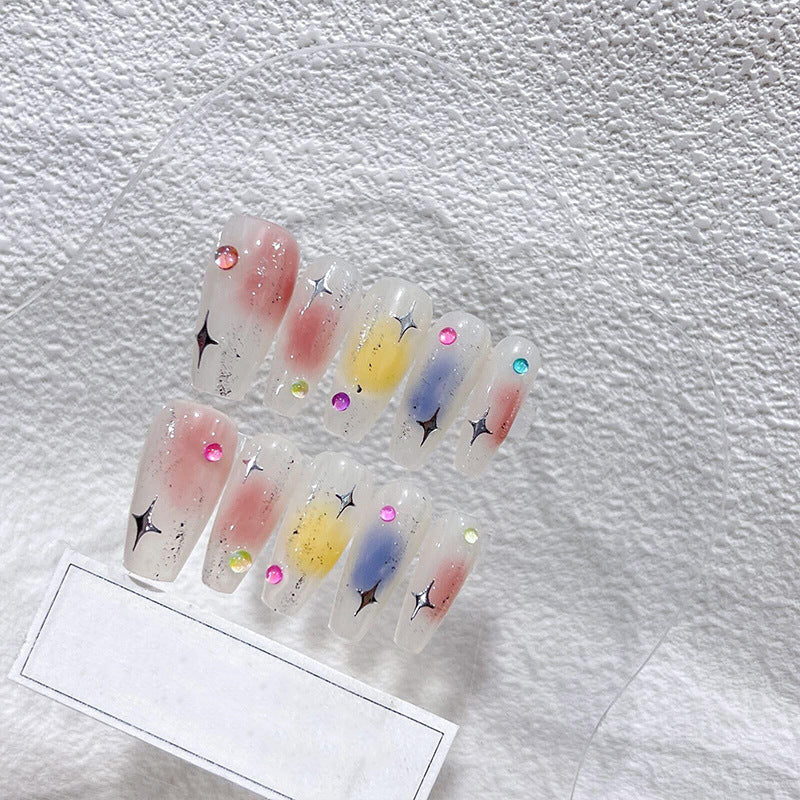 Press-On Nails - Cosmic Sparkle: Shimmering cosmic dust in shades of blue and purple adorns each nail, capturing the essence of the cosmos.