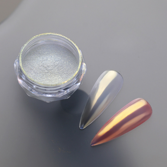 An image showcasing BOMD Chrome Nail Powder applied to fake nails, displaying a striking mirror-like finish with a dazzling metallic sheen, highlighting the brilliance and versatility of the product. Orange/peach chrome