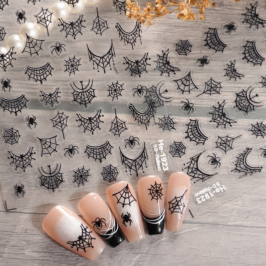 Redanco HE-1923 black embossed spider web stickers with nude and black manicure examples