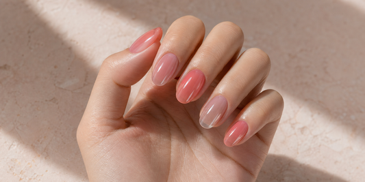Pink and glassy jelly nails in soft daylight