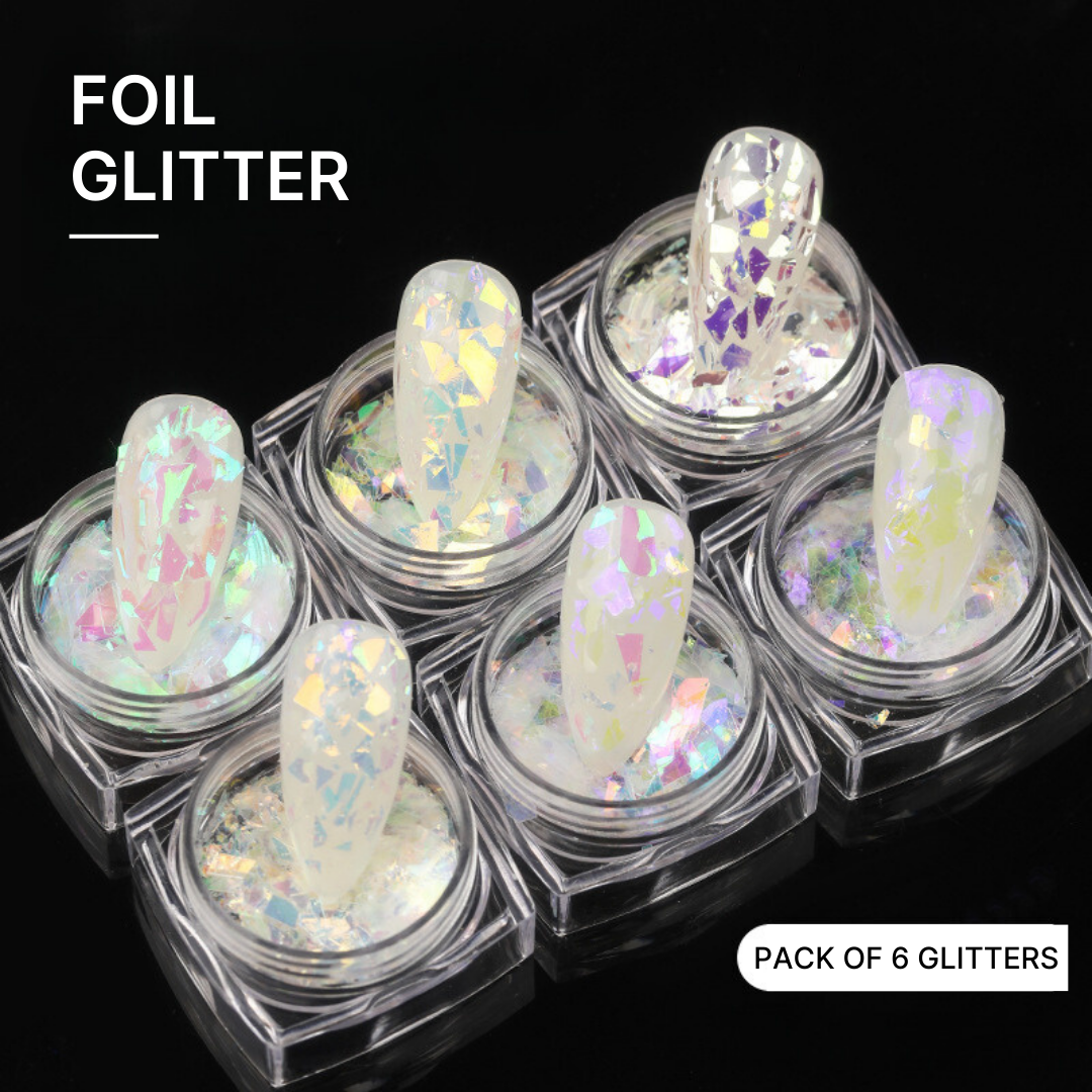 Pack of six foil glitter containers displayed, each filled with multi-colored, iridescent flakes designed for creating sparkling, eye-catching nail art.