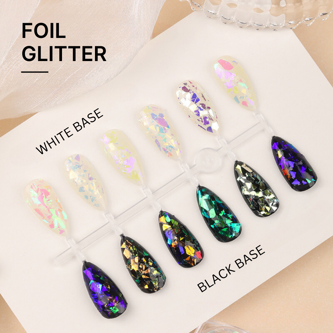 Demonstration of nail designs using foil glitter on both white and black bases, illustrating how the iridescent flakes enhance nails with vibrant, reflective colors.