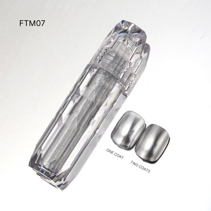 FTM07 displays silver Liquid Chrome nail polishes, providing a sleek, futuristic look with a mirror-like finish.