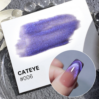 Cateye Polish #006 in a deep blue shade with a magnetic effect, creating a mesmerizing manicure experience.