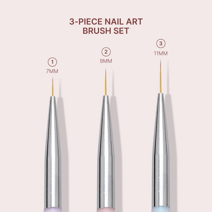 Close-up view of three nail brushes from a nail art set, each with different tip lengths (7mm, 9mm, 11mm) for various nail art techniques, arranged against a pastel background to highlight their delicate design and professional use.