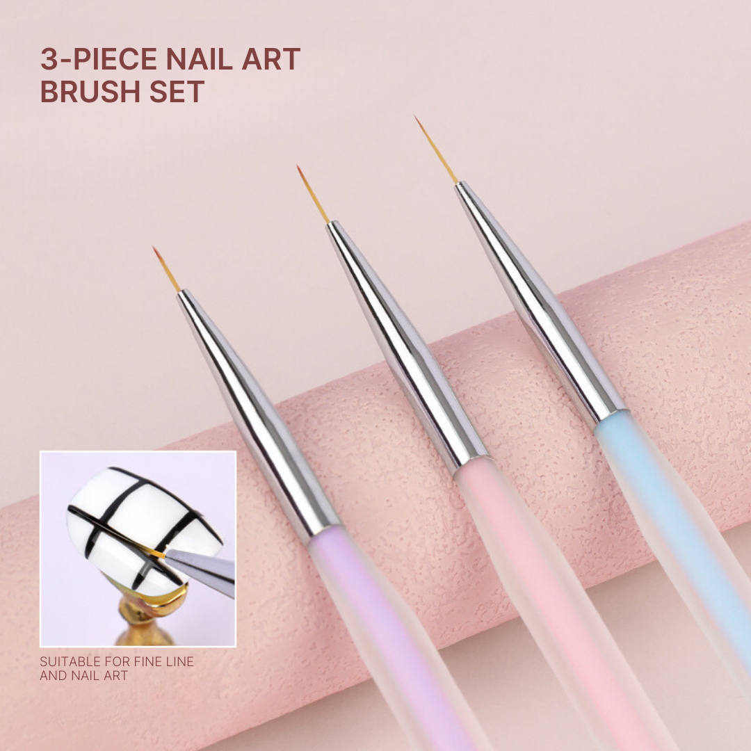 Image showcasing a 3-piece nail art brush set with gradient blue and pink handles and fine tips, ideal for detailed nail designs. The set is displayed on a soft pink background, emphasizing the precision capabilities of these nail brushes.