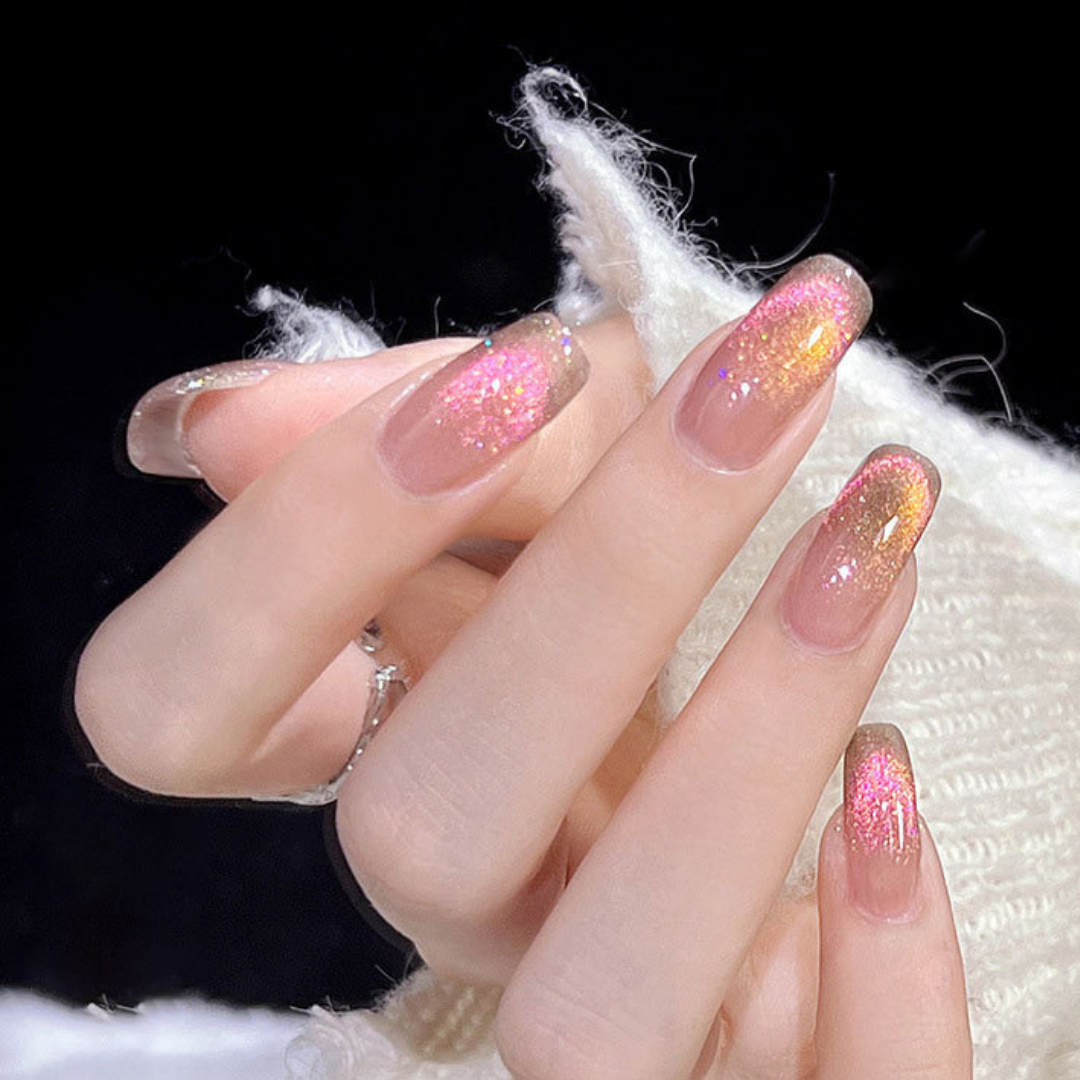 Close-up of nails with a cat eye effect: "Close-up view of fingernails painted with BOMD cat eye gel polish, featuring a mesmerizing magnetic shimmer effect in a light peach shade."