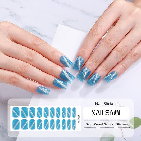 Hand with nails in a vivid blue chrome gel nail sticker design, with a NAILSAMI gel nail sticker sheet displayed below featuring the same chrome design.