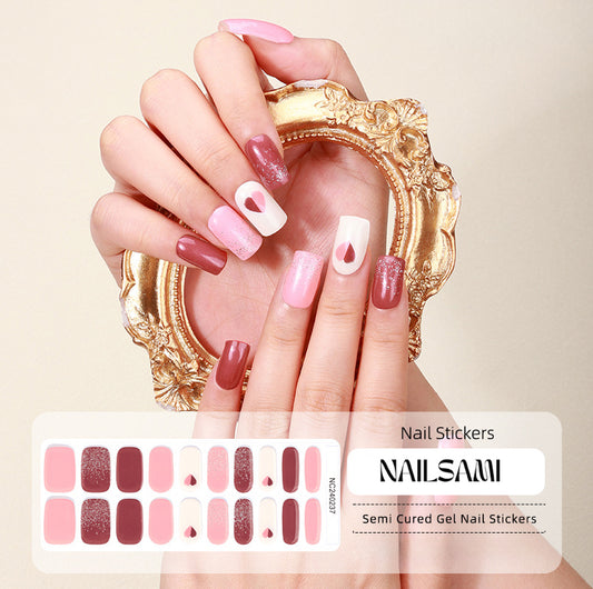 Hand with nails in a soft blush and white checkered gel nail sticker design, with a NAILSAMI gel nail sticker sheet displayed below featuring the same checkered pattern.