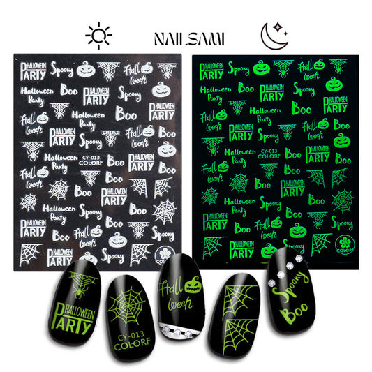 Ghostly Chants - Ghost Patterns & Symbols" nail stickers by NAILSAMI include various ghost designs and magical symbols, glowing under UV light.