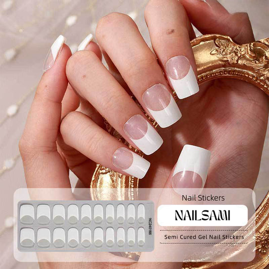 Hand with nails featuring a classic white French tip gel nail sticker design, with a NAILSAMI gel nail sticker sheet displayed below showcasing the same white French tip design.