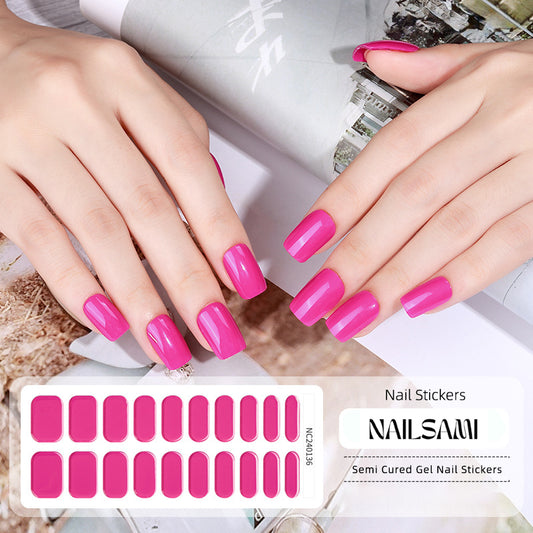 Hand with nails adorned in a bold fuchsia gel nail sticker design, with a NAILSAMI gel nail sticker sheet displayed below featuring the same fuchsia design.