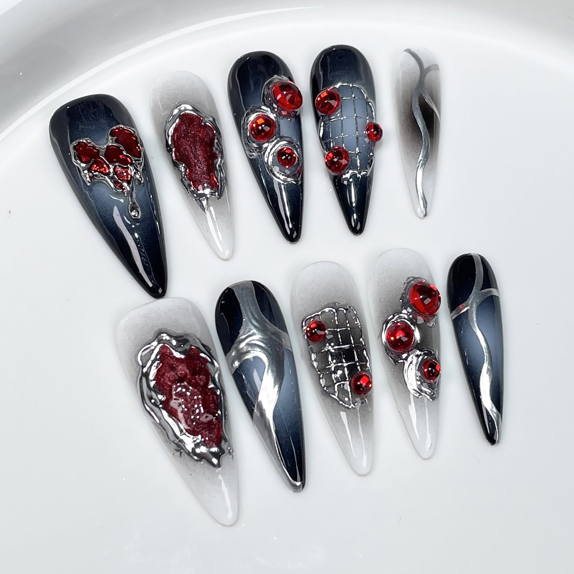 Halloween nails black to silver ombre with 3D red gemstones and silver accents