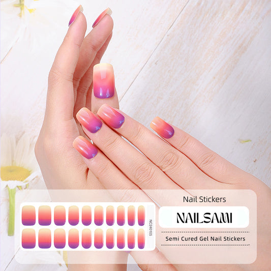 Hand with nails in a warm pink and orange gradient gel nail sticker design, with a NAILSAMI gel nail sticker sheet displayed below showcasing the same gradient design.