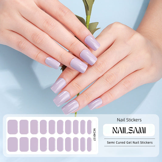 Hand with nails in a soft lilac gel nail sticker design, with a NAILSAMI gel nail sticker sheet displayed below showcasing the same lilac design.