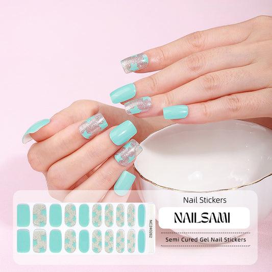 Hand with nails featuring a soft mint green gel nail sticker design with frosty accents, with a NAILSAMI gel nail sticker sheet displayed below showcasing the same mint and white design.