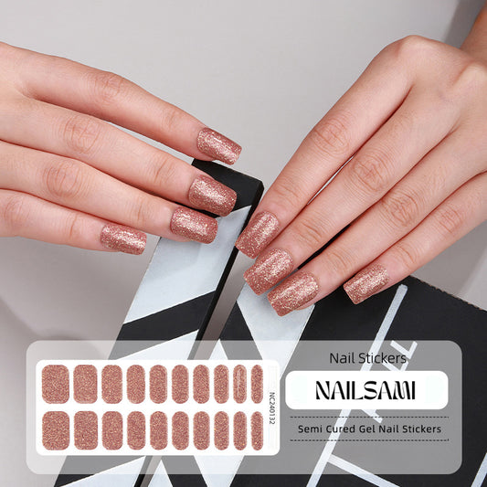 Hand with nails in a sophisticated nude gel nail sticker design, with a NAILSAMI gel nail sticker sheet displayed below featuring the same nude design.