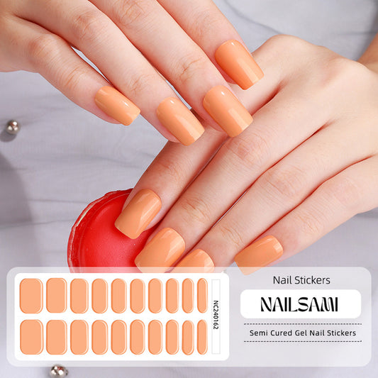 Hand with nails in a warm peachy gel nail sticker design, with a NAILSAMI gel nail sticker sheet displayed below featuring the same peach design.