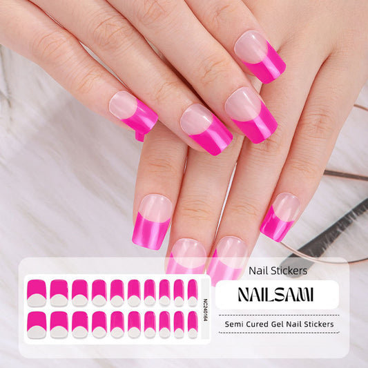 Hand with nails in a classic French tip design with vibrant pink tips, with a NAILSAMI gel nail sticker sheet displayed below featuring the same pink French tip design.