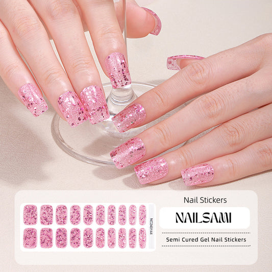 Hand with nails featuring a sparkling pink glitter gel nail sticker design, with a NAILSAMI gel nail sticker sheet displayed below showcasing the same pink glitter design.