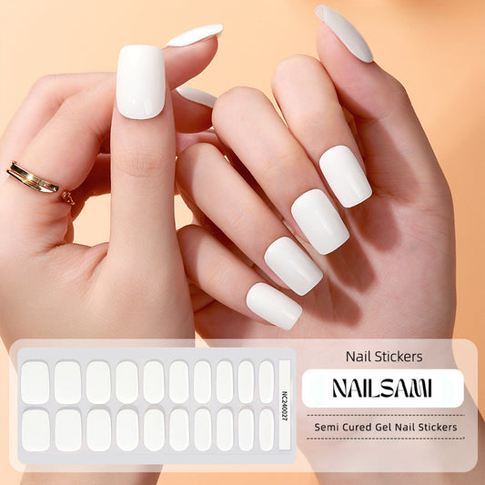 Hand with nails in a solid white gel nail sticker design, with a NAILSAMI gel nail sticker sheet displayed below featuring the same white design.