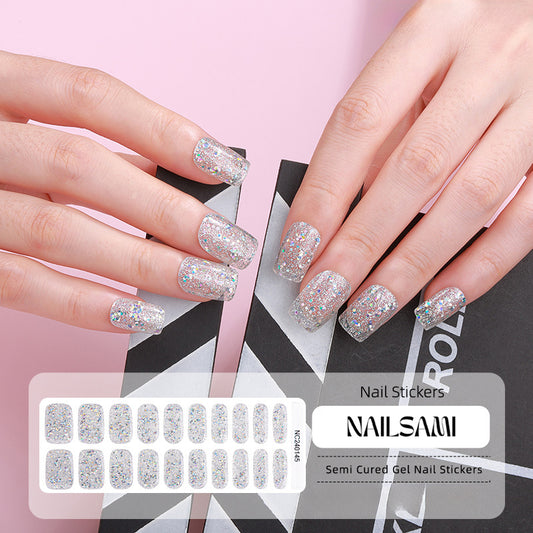 Hand with nails adorned in a shimmering silver glitter gel nail sticker design, with a NAILSAMI gel nail sticker sheet displayed below featuring the same silver design.