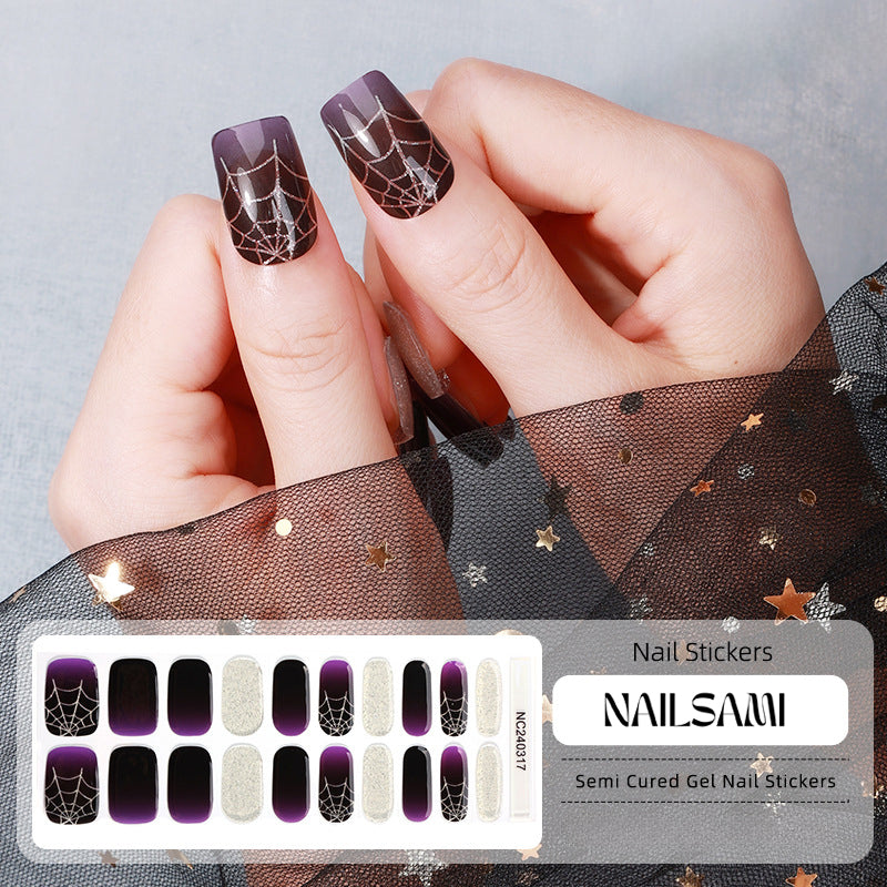 Hand with nails in a dark purple gel nail sticker design with starry and mystical accents, with a NAILSAMI gel nail sticker sheet displayed below showcasing the same Halloween-themed design.