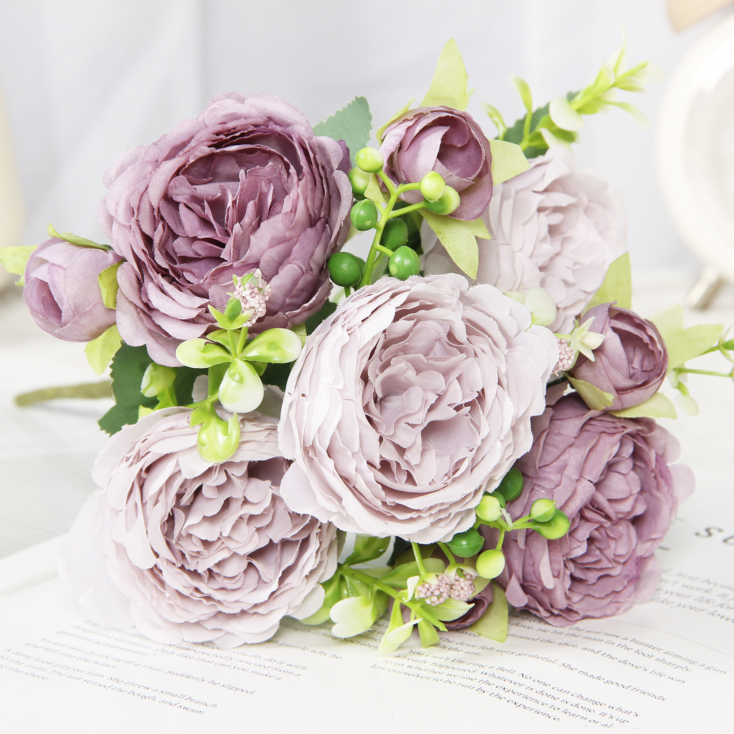 Purple artificial peony and rose bouquet