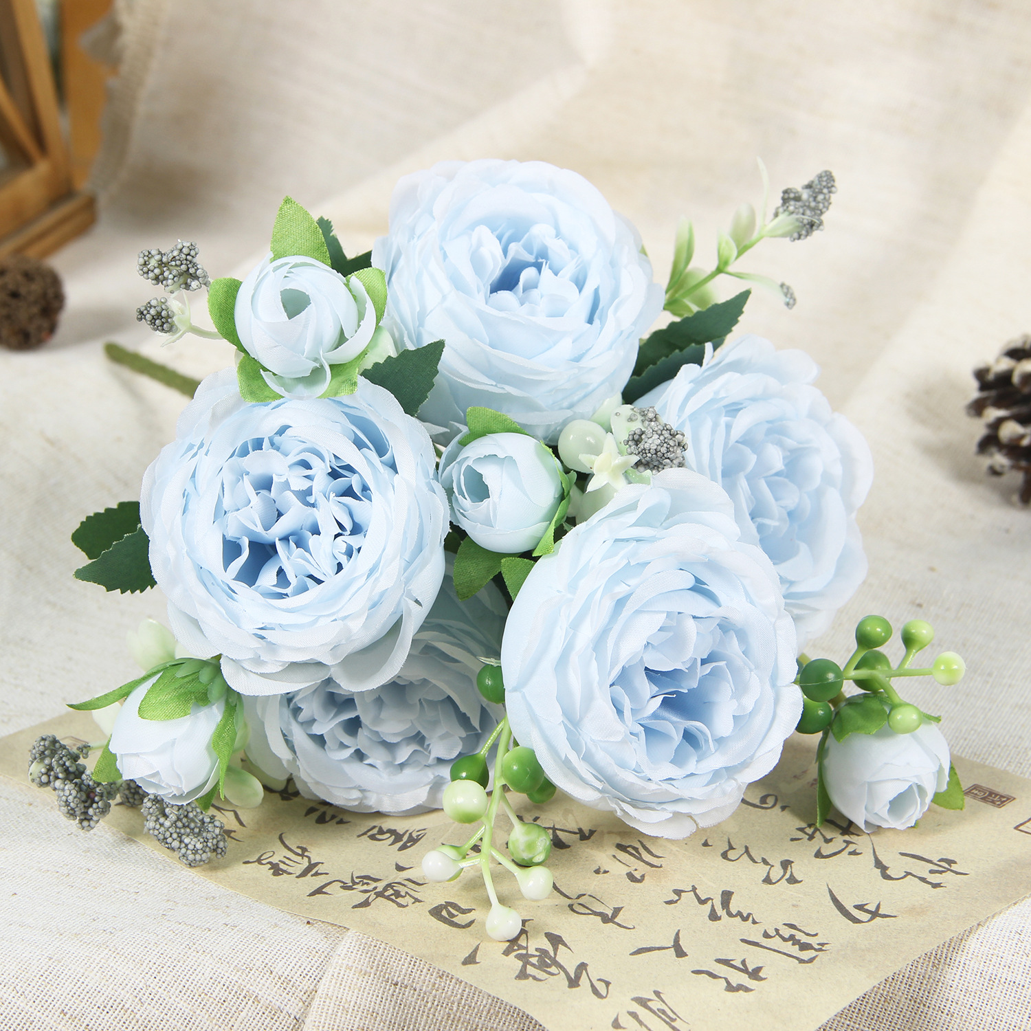 Blue artificial peony and rose bouquet
