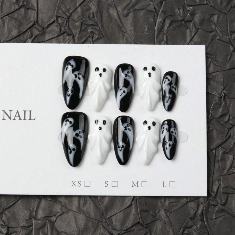 Full black and white Halloween ghost press-on nail design on display card