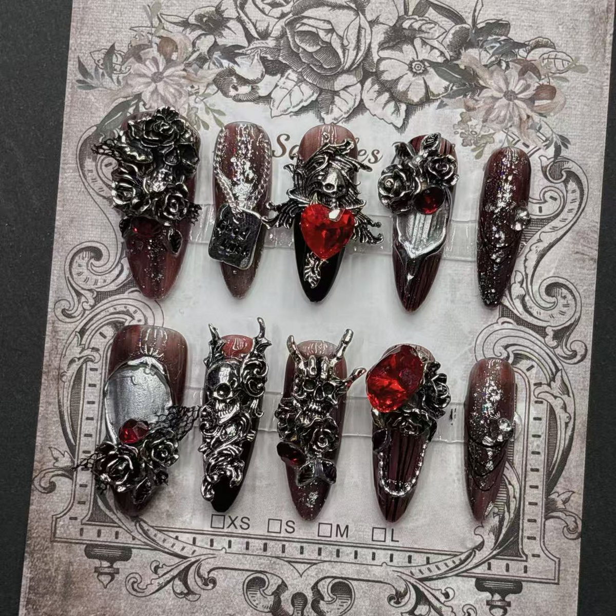 Full burgundy and black skull rose press-on nail design with raised gothic details