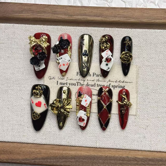Burgundy black and gold playing-card press-on nail set with roses and raised accents