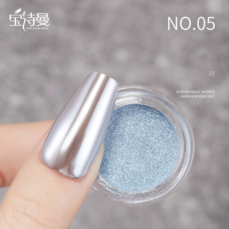 Mirror Chrome Nail Powder #05: Elegant green mirror chrome nail powder #05, features a deep emerald hue for a stunning, jewel-toned effect on nails. Ideal for those seeking a luxurious and unique nail enhancement.