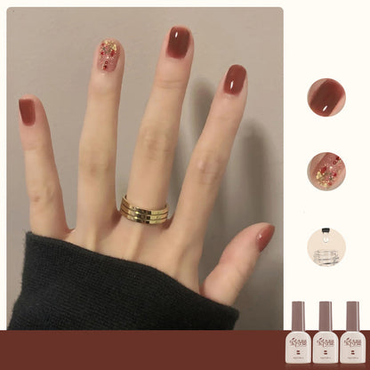 Rum Red + Fireworks Star + Tempered Top Coat cat eye gel polish for bold and glamorous nail designs with a rum red base, enhanced by fireworks star and tempered top coat for a striking and sophisticated appearance