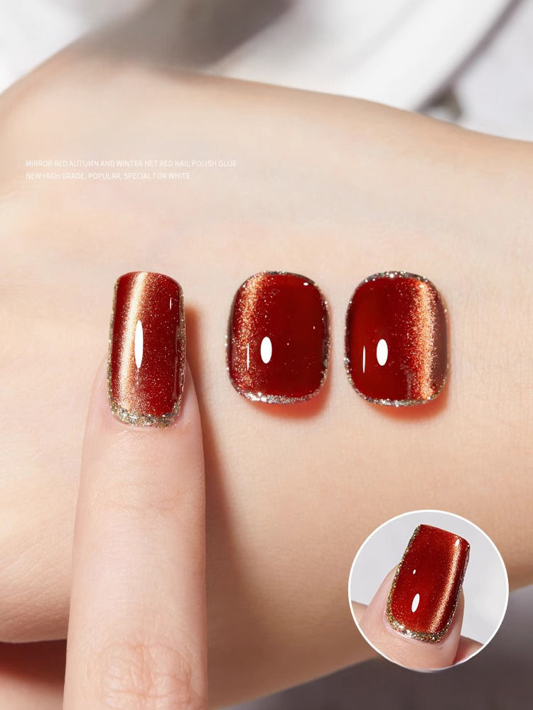 Cat eye gel polish 09 for sophisticated nail designs with a rich red cat eye effect, ideal for glamorous and elegant looks