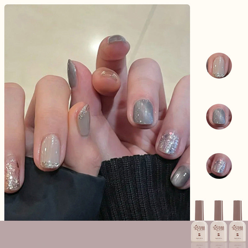 Milk Apricot Color + Fog Gray Cat Eye + Shiny Big Silver cat eye gel polish for creating sophisticated and refined nail designs with a soft milk apricot color and fog gray cat eye shimmer, accented with shiny big silver for an elegant appearance