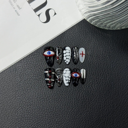 Gothic almond press-on nail set with eye motifs, red crosses and silver-tone accents
