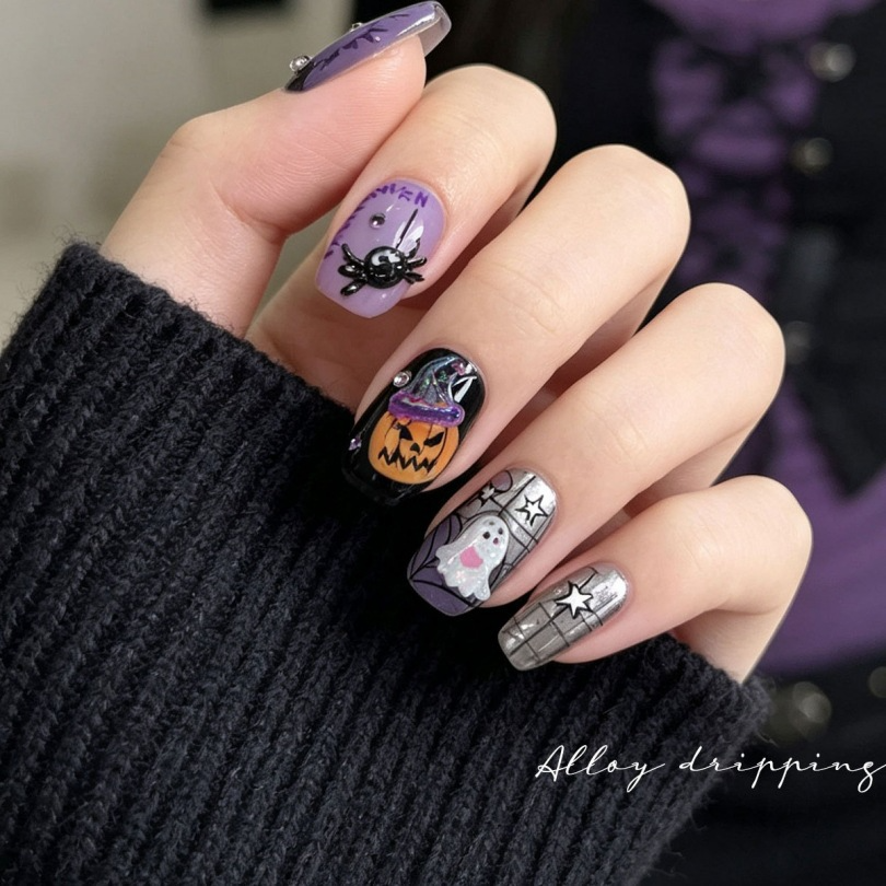 Halloween manicure example with spider pumpkin and ghost resin nail charms