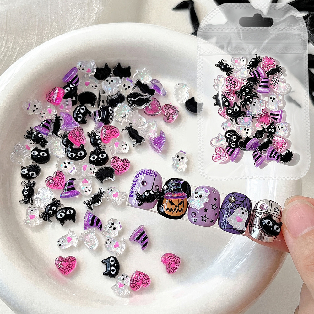 Halloween resin nail charm motif range with decorated manicure examples