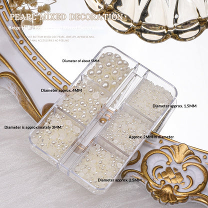 Ivory flat-back resin pearl mix in a six-compartment box with size labels