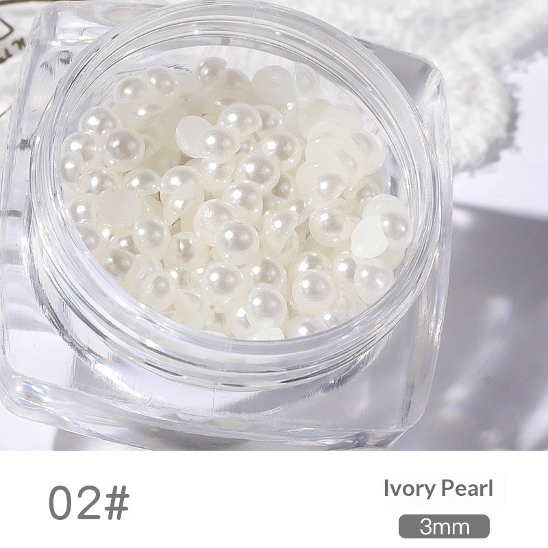 Close-up of 3 mm resin pearl nail art decorations in a square jar