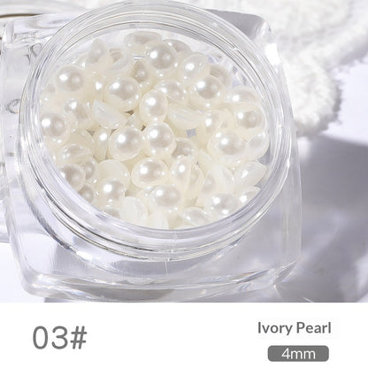 Close-up of 4 mm resin pearl nail art decorations in a square jar