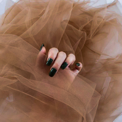 Brown sheer tulle backdrop styled for nail photography