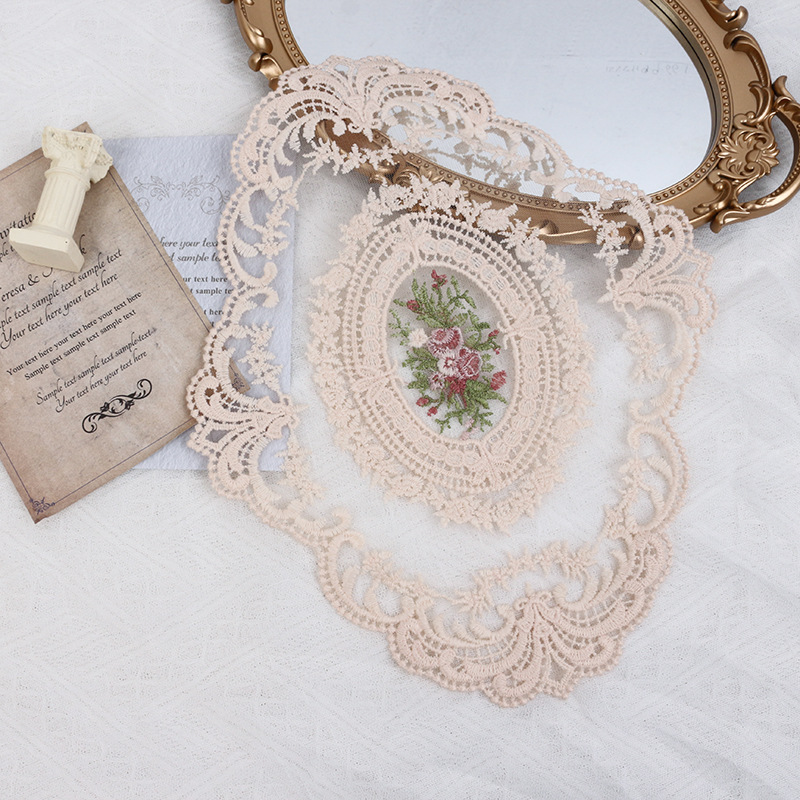 Beige oval floral embroidered lace photography styling mat with a vintage mirror