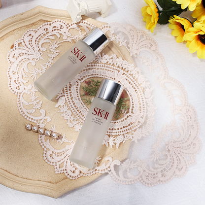 Beige floral embroidered lace mat styled for cosmetic product photography