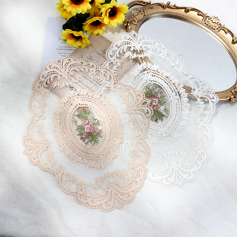 Beige and white floral embroidered lace photography styling mats shown together