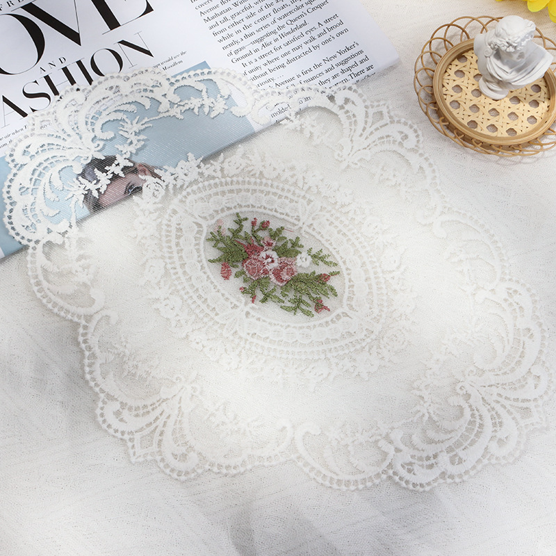 White oval floral embroidered lace styling mat for product photography